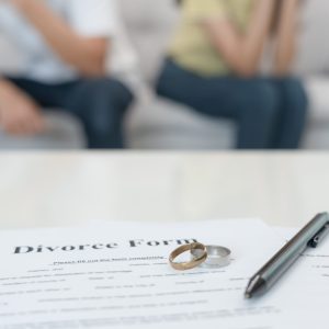 Quarrel, Divorce. husband and wife remove married ring. Couples desperate and disappoint after marriage. Divorce document, upset and frustrated after conflict. distrust, love problems, betrayals